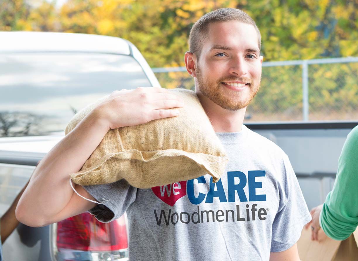 A young man helps out at local food drive